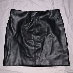 Black faux leather mini skirt